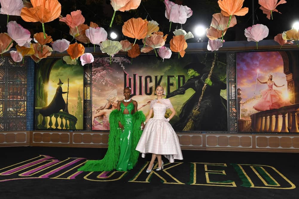 British actress and singer Cynthia Erivo (L) and US singer-songwriter and actress Ariana Grande attend Universal's "Wicked" premiere at the Dorothy Chandler Pavilion in Los Angeles, November 9, 2024. (Photo by VALERIE MACON / AFP) (Photo by VALERIE MACON/AFP via Getty Images)