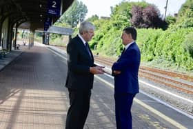 Transport ministers John O'Dowd and Eamon Ryan.