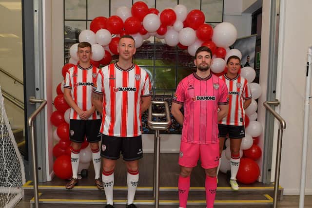 Shane McEleney pictured modelling the new Derry City jersey with Ciaron Harkin, Tadhg Ryan and Shannon Dunne. Photo: George Sweeney