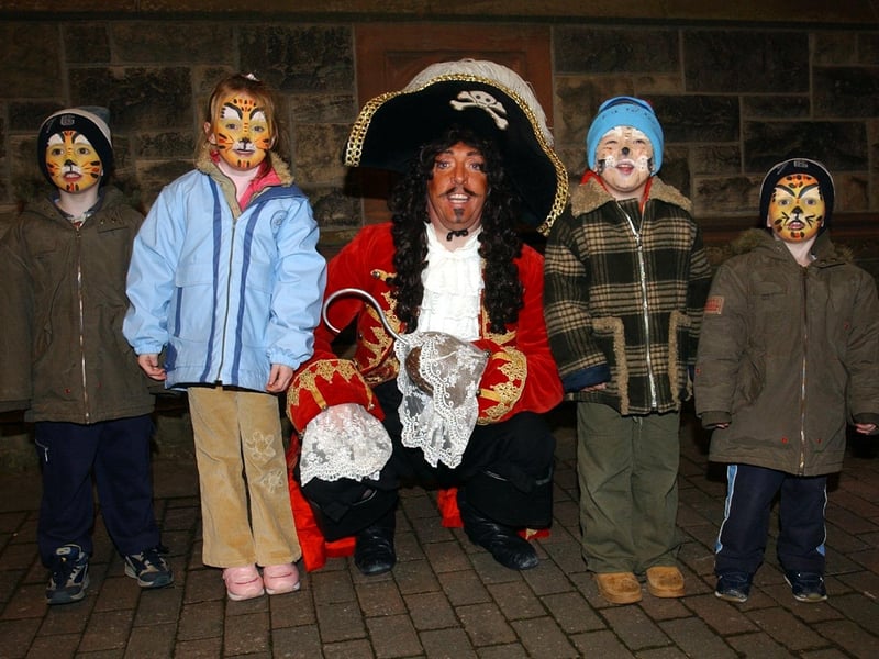 Captain Cook (Conal Gallen) with, from left, Kyle Harkin, Laura McBride, Callum Norris and Nathan Harkin. (1911C31) : Christmas Lights Switch on, from November 2004 in the Guildhall Square.