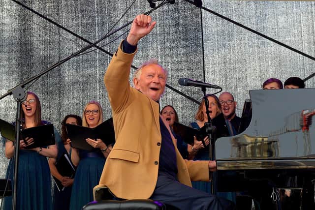 Phil Coulter pictured previously at the end of a live performance of his iconic hit ‘The Town I Loved So Well’ in Ebrington Square. Photo: George Sweeney. DER2240GS – 27