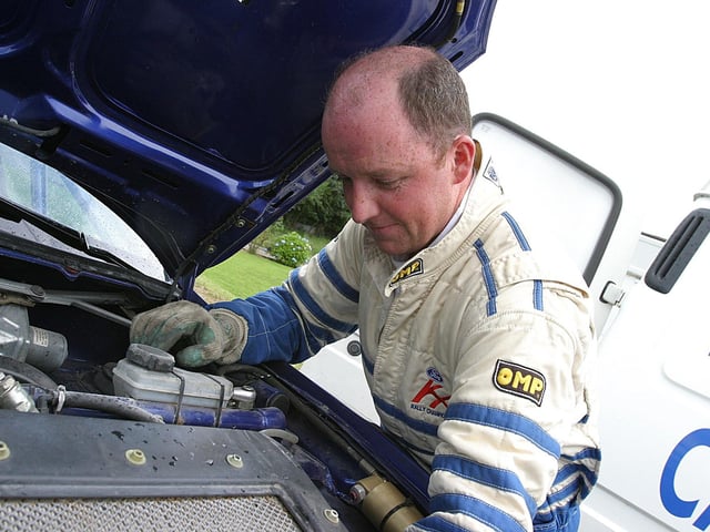 Letterkenny rally driver Andrew Hegarty, tuning the engine of his Fort Puma, during Lark in the Park.
