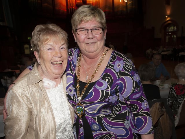 Eileen McCauley gets a photo with her good friend Angela Dobbins during Wednesday’s tea dance.