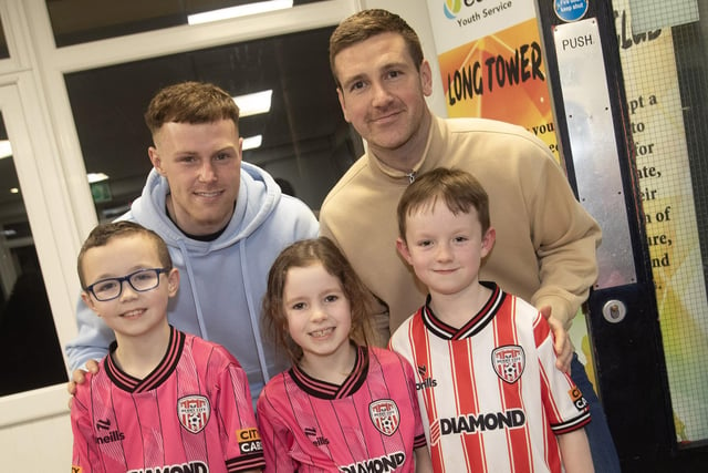 Derry City players Cameron McJannet and Patrick McEleney, who were in attendance at Tuesday's Premiere of 'City Til I Die' with some of the children from Holy Child PS who took part in the play. (Photos: Jim McCafferty Photography)