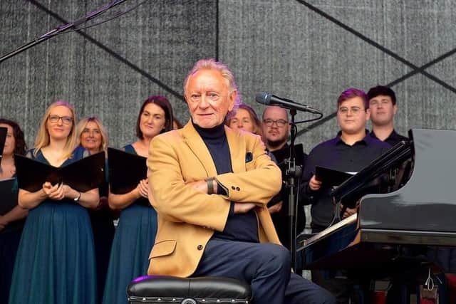 Phil Coulter pictured during the live performance of his iconic hit ‘The Town I Loved So Well’ in Ebrington Square in October. Photo: George Sweeney. DER2240GS – 01