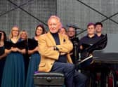 Phil Coulter pictured during the live performance of his iconic hit ‘The Town I Loved So Well’ in Ebrington Square in October. Photo: George Sweeney. DER2240GS – 01