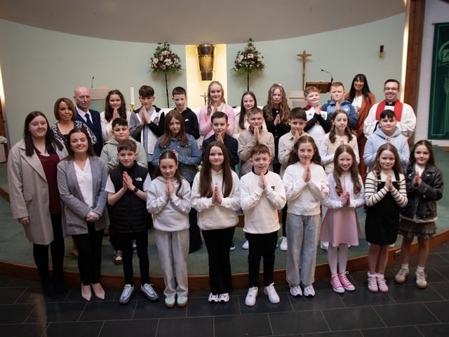 SACRED HEART PS CONFIRMATION. . . . .Mr. McGuigan's P7 class at Sacred Heart Primary School who received the Sacrament of Confirmation from Fr. Patrick Lagan at Sacred Heart Church, Waterside on Saturday last. Included is Mrs. Louise Cunning, Principal, Mr McGuigan, Class Teacher, Miss Nicole Starrett, Caoimhe Deery and Mrs Seana Clare, Learning Support Assistants. (Photos: Jim McCafferty Photography)