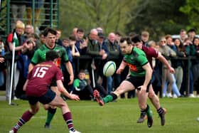 City of Derry’s Simon Logue kicks the ball forward into Enniskillen’s half . Photo: George Sweeney.  DER2316GS – 57