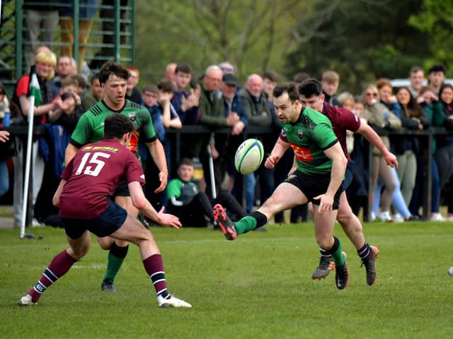 City of Derry’s Simon Logue kicks the ball forward into Enniskillen’s half . Photo: George Sweeney.  DER2316GS – 57