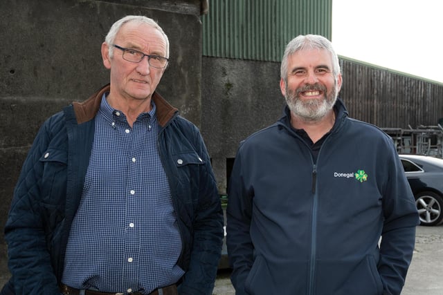 Cornelius O'Kane and Martin Carey at the IFA County Executive Dairy Meeting on the farm of Charles McCandless, Culdaff on Thursday last.  Photo Clive Wasson.