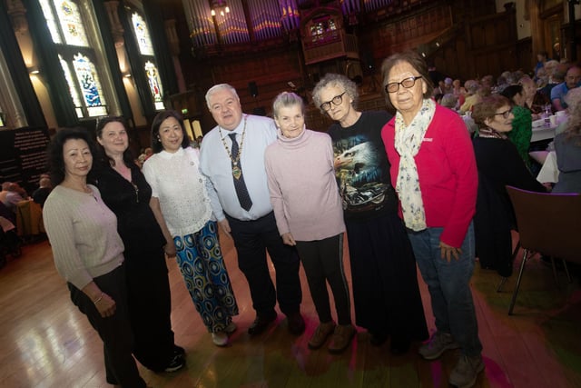Deputy Mayor Darren Guy pictured at the Mayor's Tea Dance on Wednesday with a group from the local Chinese community.