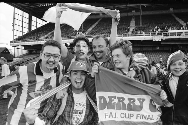 Ecstatic Derry City fans celebrate victory.