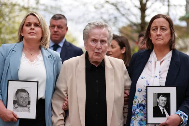 Supporters of the family of GAA official Seán Brown, with widow Bridie Brown (centre), daughter Clare Loughran (left) and daughter Siobhan Brown (right) outside Belfast's Court of Appeal last year. Picture date: Friday May 2, 2025.