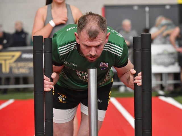 Competitor takes part in ‘Sled Push’ during the Maiden City Hyrox V Fitness Challenge held at Sean Dolans GAC on Saturday. Photograph: George Sweeney