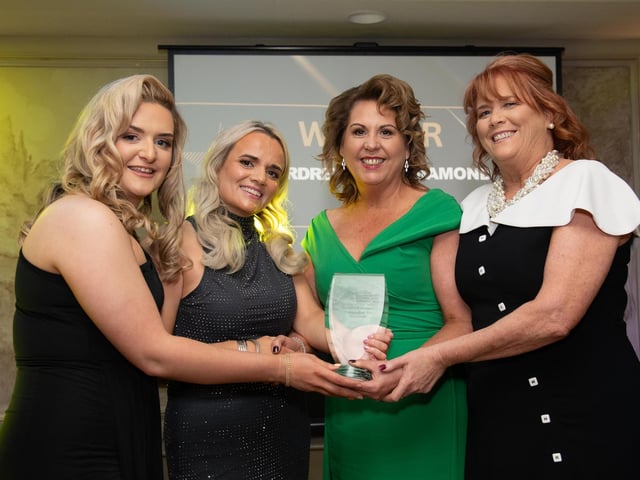 Deirdre McGowan, AIB Carndonagh, presents the Retailer of the Year Award to Deirdre's @The Diamond Deirdre Bradly accompanied by Rachel Bradley (left) and Sarah Bromley (right) at the Carndonagh Traders Association Business and Community Awards in Ballyliffen Lodge Hotel on Saturday night last. Photo Clive Wasson