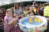'Get The Duck' fun at the Gasyard on Friday. (Photos: Jim McCafferty Photography) : .