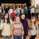 Singers gathered together this week for final rehersals for the Derry Girls Big Sing event, as part of the 10th annual City of Derry International Choir Festival. Pictured recreating the famous Derry Girls mural are:  Cian O’Dowd, St Columbs college, Emer Afram Foyle College, Éabha Grant Scoil Mhuire Buncrana, Sophie Webster Scoil Mhuire Buncrana  and Sophie Coyle Foyle College