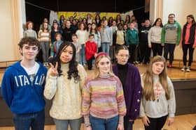 Singers gathered together this week for final rehersals for the Derry Girls Big Sing event, as part of the 10th annual City of Derry International Choir Festival. Pictured recreating the famous Derry Girls mural are:  Cian O’Dowd, St Columbs college, Emer Afram Foyle College, Éabha Grant Scoil Mhuire Buncrana, Sophie Webster Scoil Mhuire Buncrana  and Sophie Coyle Foyle College