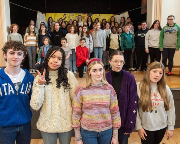 Singers gathered together this week for final rehersals for the Derry Girls Big Sing event, as part of the 10th annual City of Derry International Choir Festival. Pictured recreating the famous Derry Girls mural are:  Cian O’Dowd, St Columbs college, Emer Afram Foyle College, Éabha Grant Scoil Mhuire Buncrana, Sophie Webster Scoil Mhuire Buncrana  and Sophie Coyle Foyle College