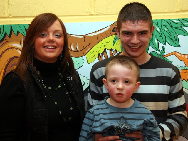 Tyler poses for a photograph with Godmother Pat and uncle Myles 0020JML : Parties and celebrations April 2006: Tyler McMenamin.