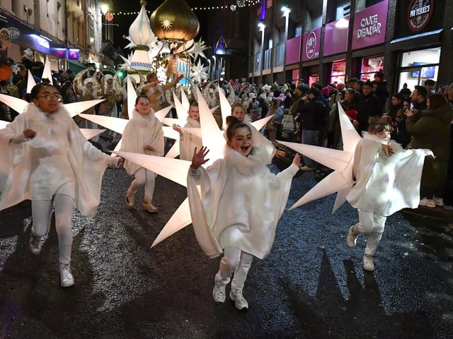 The Derry Magical Christmas procession makes its way around the city centre on Friday evening. Photo: George Sweeney