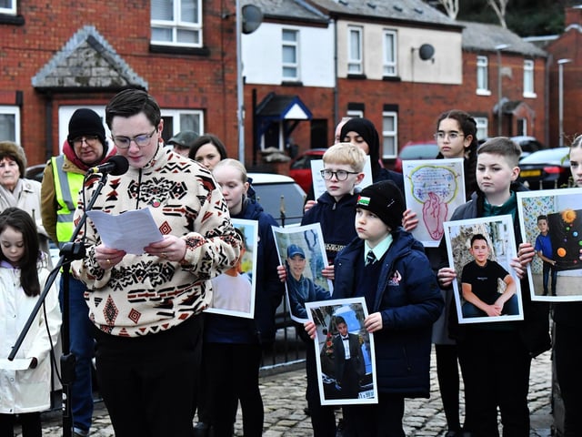 Evan Curran, a relative of William Nash, reads a statement at the one minute silence dedicated to the children of Gaza at the Bloody Sunday monument on Thursday afternoon. Photo: George Sweeney