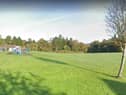 The new park will be located on this green space at the entrance to Currynierin.