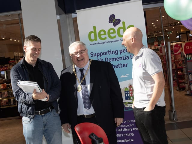 Local Councillor Sean Harkin shares a joke with Deputy Mayor Darren Guy and George McGowan, Project Director, OLT/DEEDS during Friday's 'One Stop Shop for Information on Dementia' held at Derry's Foyleside.