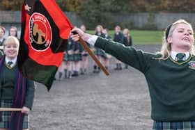Erin from Derry Girls flying the HB Torshavn flag.