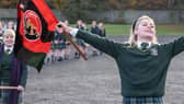 Erin from Derry Girls flying the HB Torshavn flag.