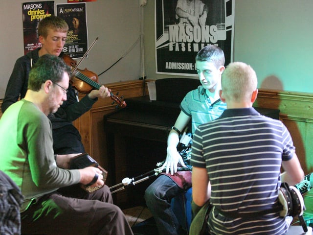 A session gets under way in Mason's Bar, Magazine Street on Sunday afternoon, as part of the Fleadh opening. DER3313JM028