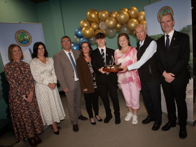 St. Columb's College's Luke Prigent receiving The Languages Prize from Mr and Mrs Breslin, sponsors at last week's Senior Awards. Included from left are Ms E Kerr, board of governors, Mrs D Duffy, Senior Teacher, Luke’s Parents Mr and Mrs Prigent and Mr FJM Madden, Principal.