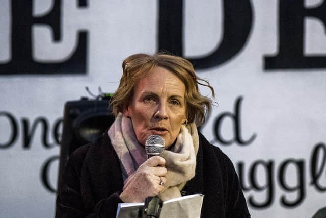 Geraldine Doherty, the niece of Gerald Donaghey who was murdered on Bloody Sunday, speaking at the ‘Black Flag Solidarity Vigil’ on Friday evening at Free Derry Wall, in solidarity with the Bloody Sunday families in the wake of the verdict delivered in the trial of Soldier F at Belfast Crown Court on Thursday. Photo: George Sweeney