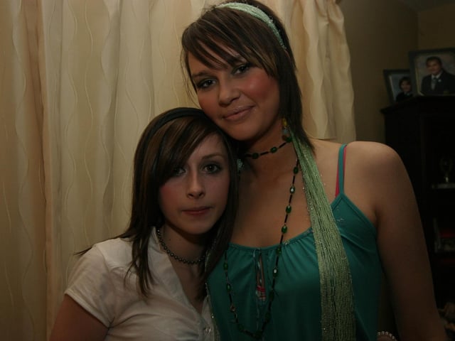 Emma Maire Green smiles for the photographer with her best frend Maeve McCann.0011/JML : Parties across Derry in January 2006.