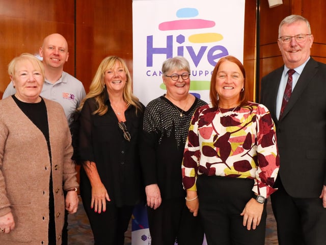 The Board of Governors of Hive Cancer Support pictured with NI Health Minister Mike Nesbitt at the the World Cancer day Conference in Derry.