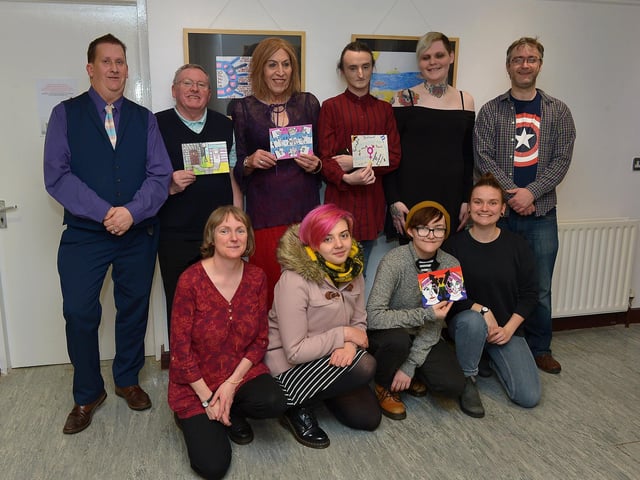 Judi Logue from Eden Place Arts Centre, on the left at the front, pictured with members of the Rainbow Project and the Project’s Transderry Group at the recent launch of Transgender Day of Remembrance Exhibition held in the Pilot’s Row centre. DER4719GS - 022