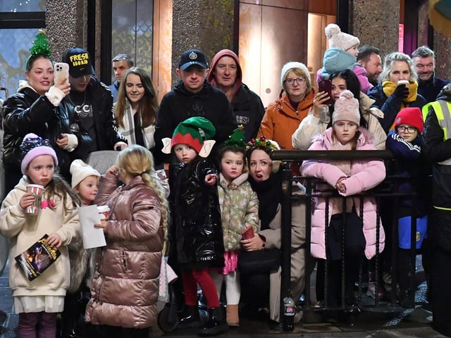 Families at the Derry Magical Christmas procession on Friday evening. Photo: George Sweeney
