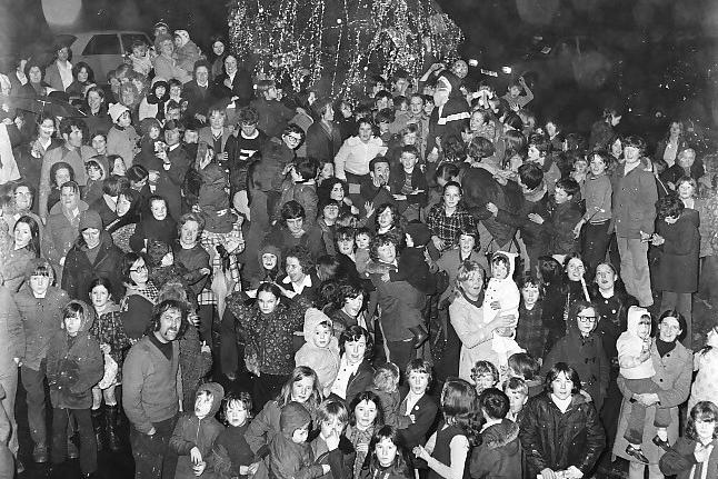 Residents in the Bogside gathered on Westland Street for the switch on of the lights on a giant 35ft Christmas tree donated for the area by the Bogside Community Association. People across the area raised £100 for baubles and decorations with adults and children affixing them to the tree before the switch on.