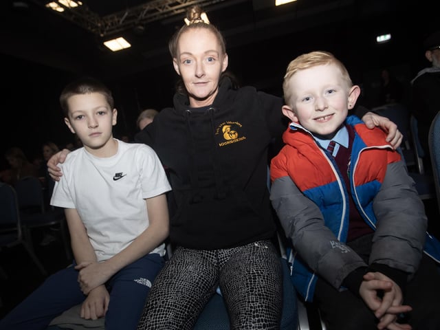 Mum Debbie McLaughlin pictured at Monday's Premier with her son John and his friend, Sean Quigley.