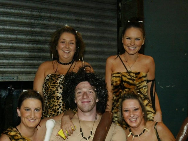 Caveman Nell with his harem of ladies Bronagh, Kitty, Amanda and Colleén.  (0411JB49):20 YEARS ON: Halloween celebrations in Derry in 2003