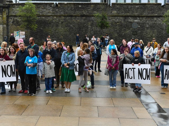 Some of the attendance, in Guildhall Square, at Caleb's Cause rally calling for legal protection for young people with Special Educational Needs who have disabilities in Northern Ireland beyond the age of 19. Photo: George Sweeney
