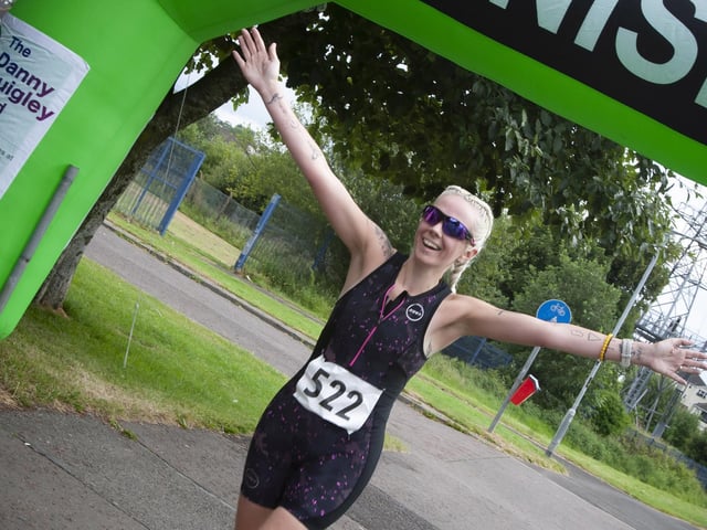 A delighted Leeann Brown crosses the finish line on Sunday.