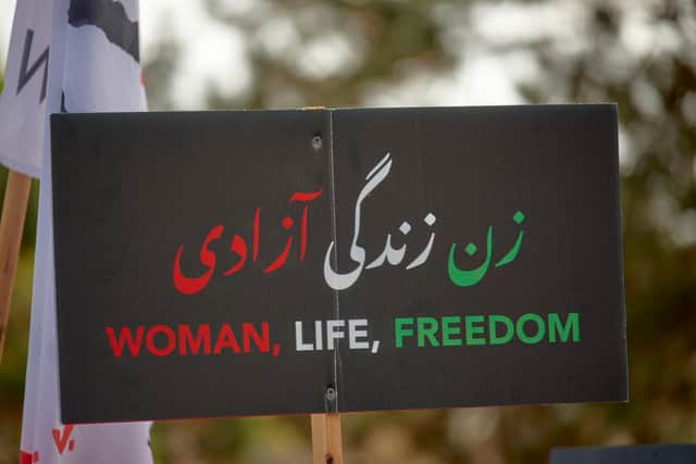 A protest sign against the Iran government