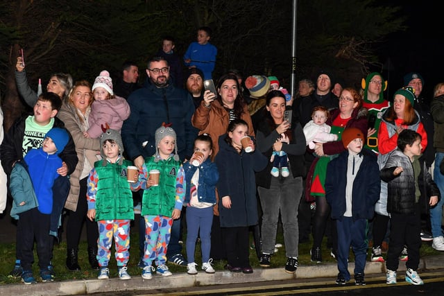 Families gather for the Elf Parade prior to the Christmas Lights switch on at the Community Hub on Friday night. Photo: George Sweeney