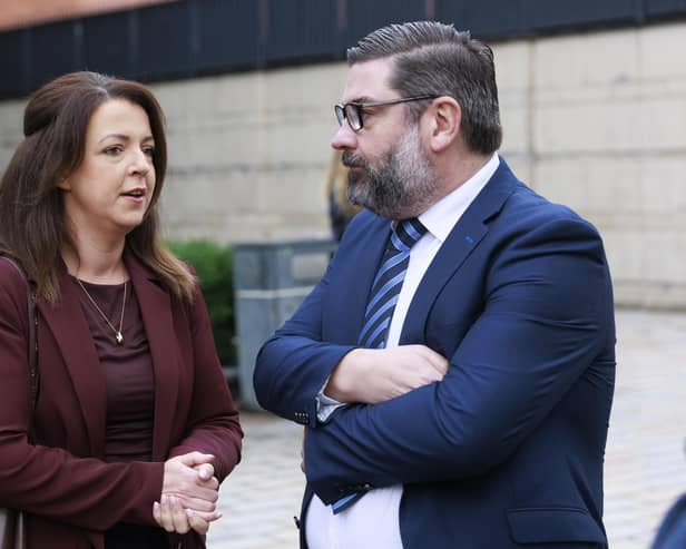 Infrastructure Minister Liz Kimmins (left) speaking with Niall McKenna, chairperson of the A5 - Enough is Enough group, outside Laganside Courts in Belfast. Liam McBurney/PA Wire
