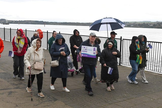 People taking part in the Foyle Hopewalk for PAPYRUS (Prevention of Young Suicide) charity, along the Foyle Embankment, on Tuesday evening last. Photo: George Sweeney