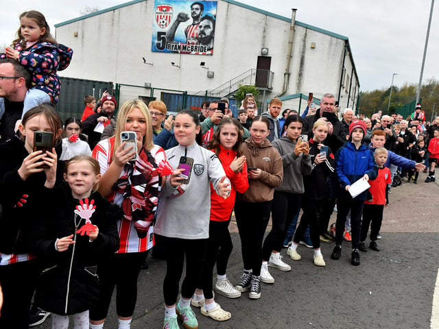 Derry City fans at the Brandywell Stadium on Saturday morning prior to the team’s departure for Dublin ahead of Sunday’s FAI Cup Final against Drogheda United. Photograph: George Sweeney