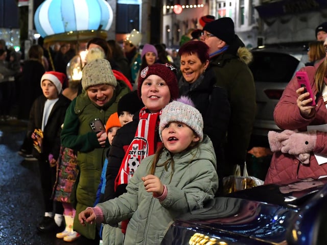 Families at the Derry Magical Christmas procession on Friday evening. Photo: George Sweeney