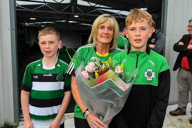 Aodhan O’Donnell’s mum, Moira, pictured alongside Seamus and Peader O’Donnell at the official opening of the Aodan O’Donnell Gym at Na Magha CLG. Photo: George Sweeney