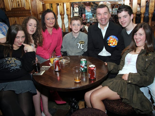 Charles smile for the camera with young party revellers, Kirsty, Lauren, Martha, Jack, Ciaran and Shannon 0090JML : Parties and celebrations April 2006: Charles Harkin.